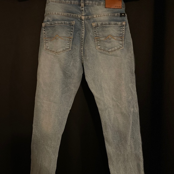 Distressed Light Blue Jeans - Picture 2 of 4